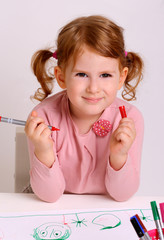 Beautiful little girl drawing