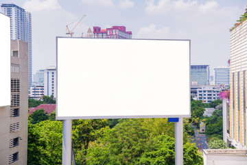 large blank billboard with city view background