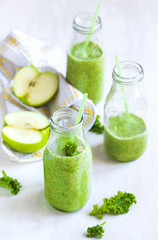 Fototapeta premium Green juice in bottle. Healthy drink.