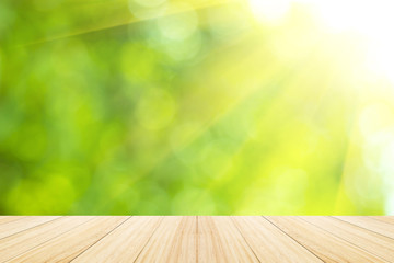 Natural bokeh background with wood terrace.