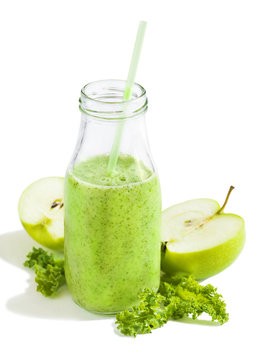 Green juice in bottle. Healthy drink.