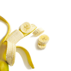 Ripe sliced banana isolated on white background