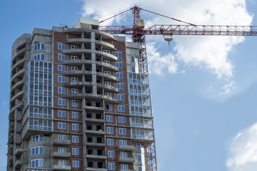 Fototapeta na wymiar the construction of a detached high-rise building