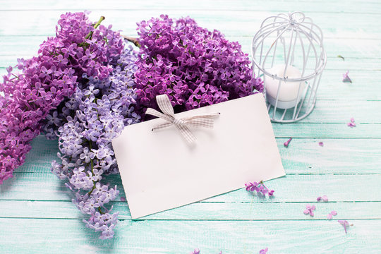 Background with  lilac flowers  and tag