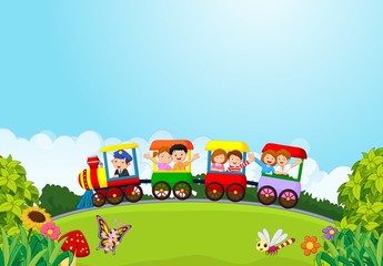 Cartoon happy kids on a colorful train © tigatelu