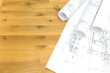 blueprints of house and rolls