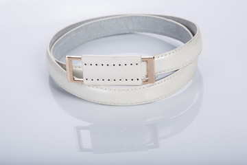 thin white female belt buckle with fine