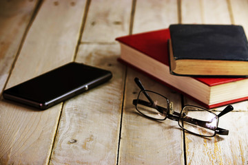Books on an old wooden surface