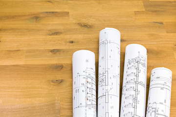 rolls of floor plan drawings