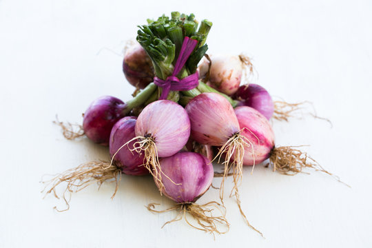 Bunch of red onions white
