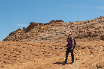 Young Woman Hiking Grand Staircase Escalante National Monument Utah