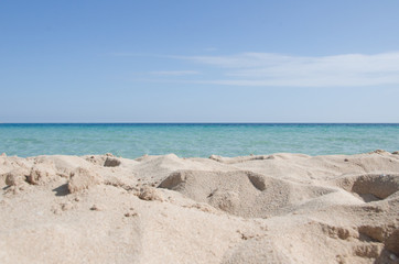 Fototapeta na wymiar Sea send and beach - Mediterranean Italian holiday background
