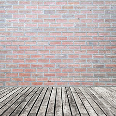 old wooden floor on brick wall grung background