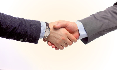 Closeup of a business handshake, on white background
