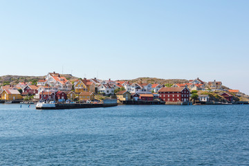 Fototapeta premium Coastal village on the rocks by the sea