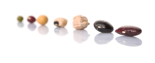 Variety of beans over white background