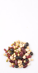 Variety of beans over white background