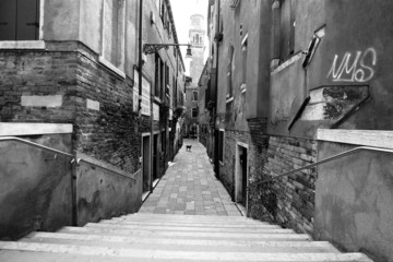 Stairs leading to a small alley between apartments in Venice