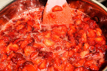 strawberry jam in a pan to cook
