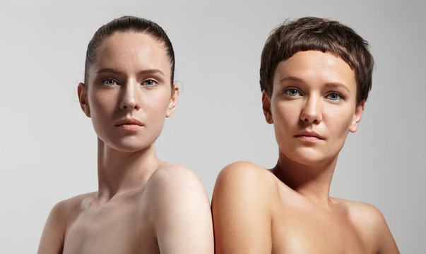 two woman with a different tone of healthy skin