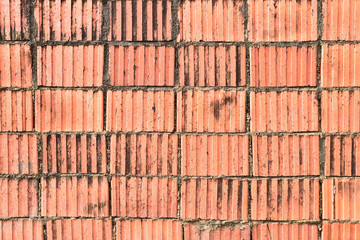 Old red walls a dark background