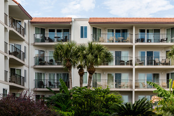 Fototapeta premium Tropical Condos with Furniture on Balconies