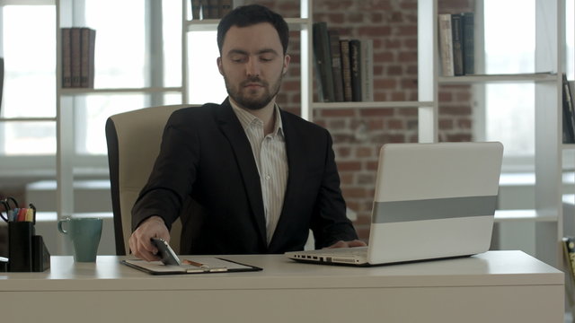 Young businessman start working with a laptop