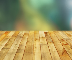 Wood plank on nature blurred background