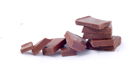 broken chocolate pieces on white background