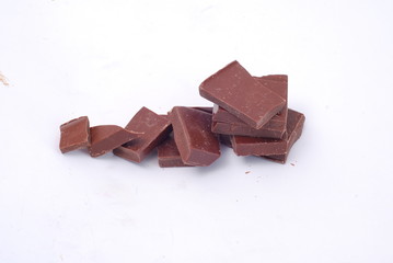 broken chocolate pieces on white background