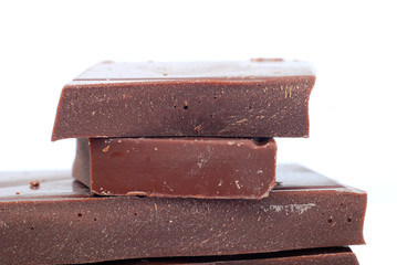 broken chocolate pieces on white background