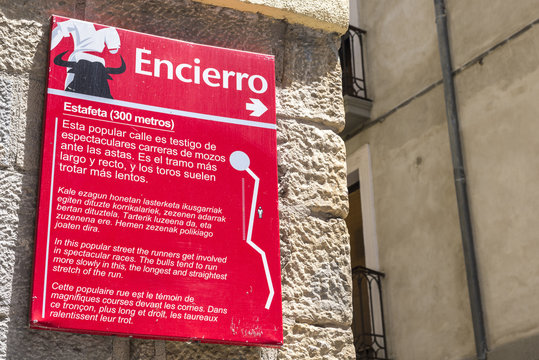 Tourist sign in Estafeta street about Encierro in Pamplona, Spain