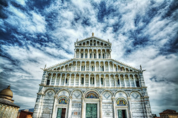 Naklejka premium Santa Maria Assunta facade under clouds