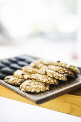 healthy natural oatmeal biscuits on wooden tray