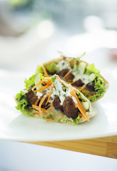 vegetarian falafel and salad in pita bread sandwich