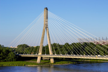 Fototapeta na wymiar Modern bridge in Warsaw over Vistula river