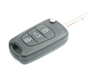car keys with alarm system on white
