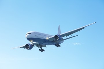 Fototapeta na wymiar Jet plane in a clear blue sky