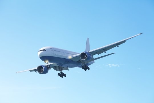 Fototapeta Jet plane in a clear blue sky
