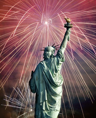 Celebrating the July 4th. Statue of Liberty and fireworks.