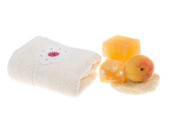 apricot and natural soap bars on white