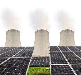 Solar energy panels before a nuclear power plant