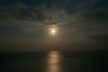 Obraz premium Sunset and dark cloud at evening