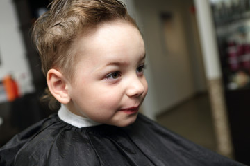 Child at hairdresser salon