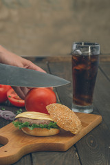 Woman preparing wonderful beef burger