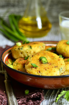 Homemade potato patties with herbs and green onion.