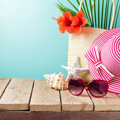 Beach accessories on wooden table