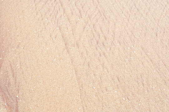 Sand pattern with golden and red sand in Sri Lanka, Asia.