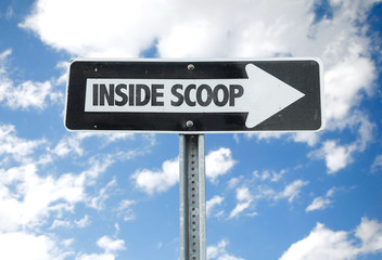 Inside Scoop direction sign with sky background
