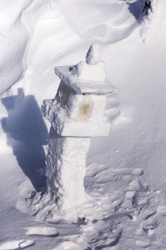 Buddhist lantern made of snow